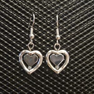 Silver framed hematite heart dangle earrings